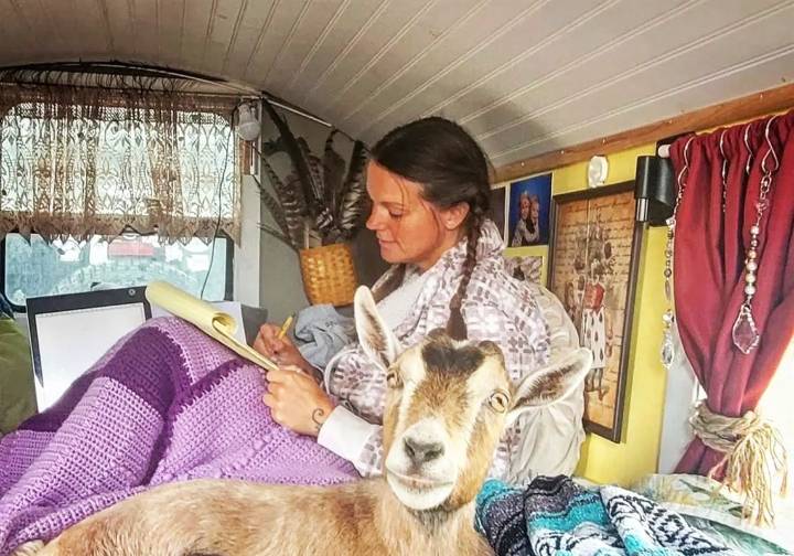 She saved a baby goat. Now they travel the country, share a bed