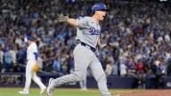 Smith’s homer in 11th lifts Dodgers over Blue Jays 5-4 to become first repeat champion in 25 years