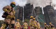 Hong Kong fire death toll rises to 55 as hundreds still missing and blaze raging