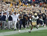 Navy QB Braxton Woodson comes to the rescue in pivotal win