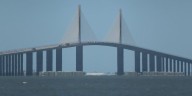 Passenger dies after being ejected from car near Skyway Bridge