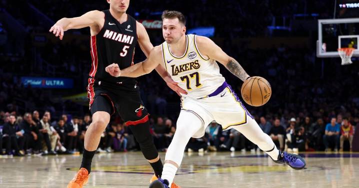 Lakers beat Heat 130-120 behind Doncic's triple