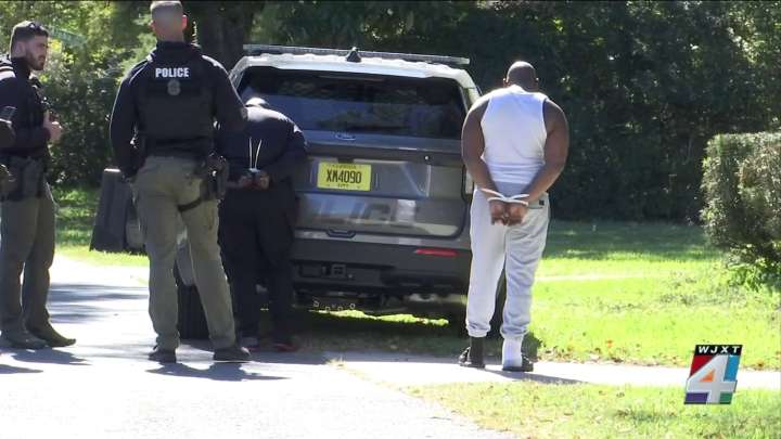 Murray Hill home raid uncovers drugs, stolen gun; two charged