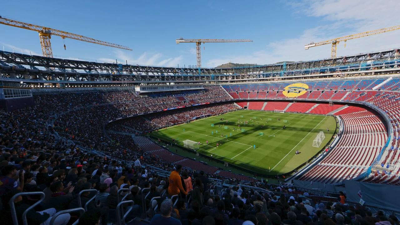 Barcelona train at Camp Nou for first time in over two years as remodeling continues; AP explains