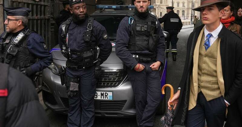 Louvre heist 'Fedora Man' embraces his mystery moment