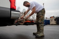 Hunters gather at Michigan buck pole on on opening day of firearm deer season