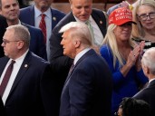 Marjorie Taylor Greene says Trump policies are 'not America first' in fight over MAGA