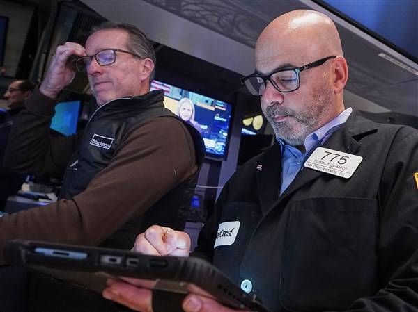 Wall Street swings through another erratic day ahead of crucial tests