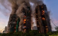 Detienen a 3 personas por incendio en rascacielos de Hong Kong