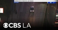 Los Angeles police pursue a stolen car in the San Fernando Valley