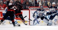 Jarvis scores a hat trick as Hurricanes pull away in third period to beat Jets 5