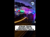 Steam train decorated in Christmas lights
