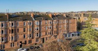 Quirky Glasgow flat with its very own climbing gym hits the market