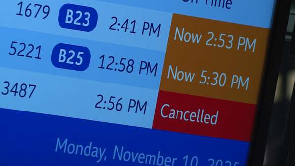 Flight cancellations impact travelers, including Sycamore High School's marching band