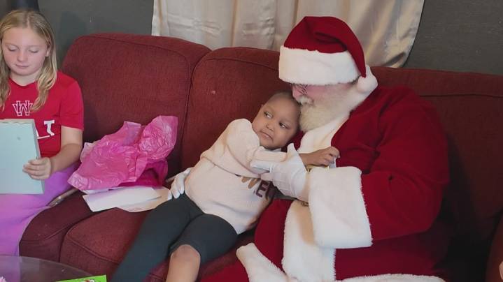 'She's a Warrior' | Community brings Christmas magic to home of 4-year-old fighting cancer
