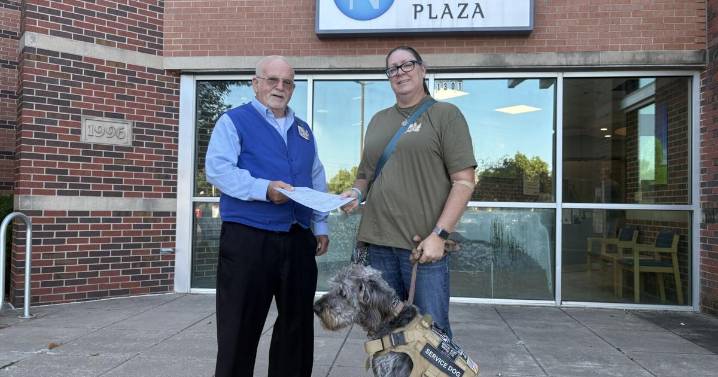 Dave Welch helps to honor fellow veterans... all at the front desk