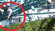 Moment woman plunges from rollercoaster in fatal accident at theme park