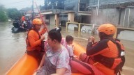 Bali floods: At least 20 people dead and six missing after flooding and landslides on holiday island