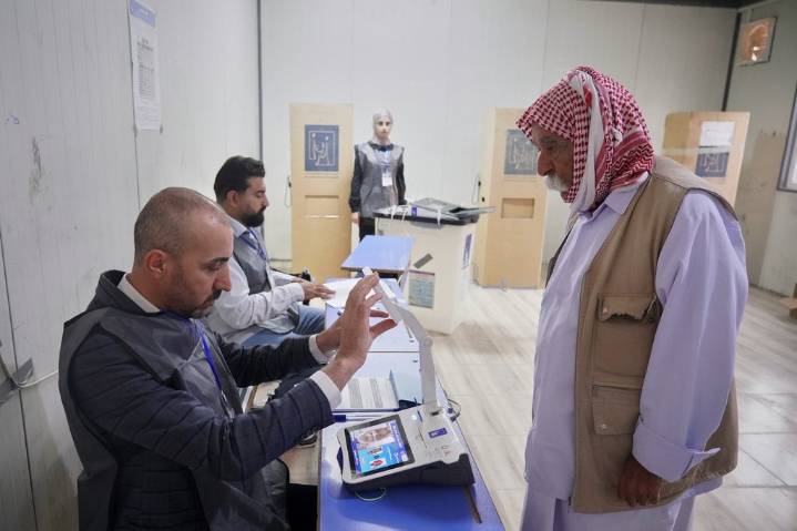 Iraq’s displaced Yazidis and security forces cast ballots in early voting in parliament election