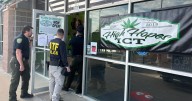 2 arrested in raids at Wichita dispensaries and homes in drugs, weapons probe