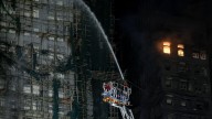Controlado el incendio en el complejo residencial de Hong Kong, que ya deja 65 muertos y numerosos desaparecidos