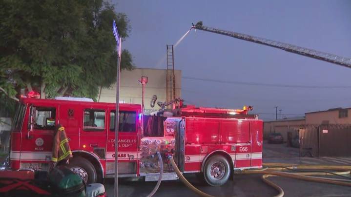 Crews put out fast-moving fire that ripped through multiple commercial buildings in L.A.
