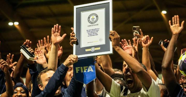 FIFA co-workers break Guinness World Record for most multinational soccer game