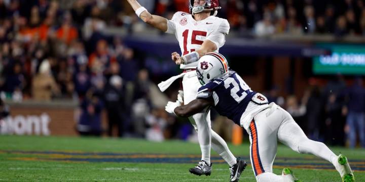 Alabama holds off Auburn 27-20 in Iron Bowl thriller, keeping playoff hopes alive