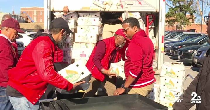 West Baltimore families receive free Thanksgiving meals from Kappa Alpha Psi fraternity giveaway