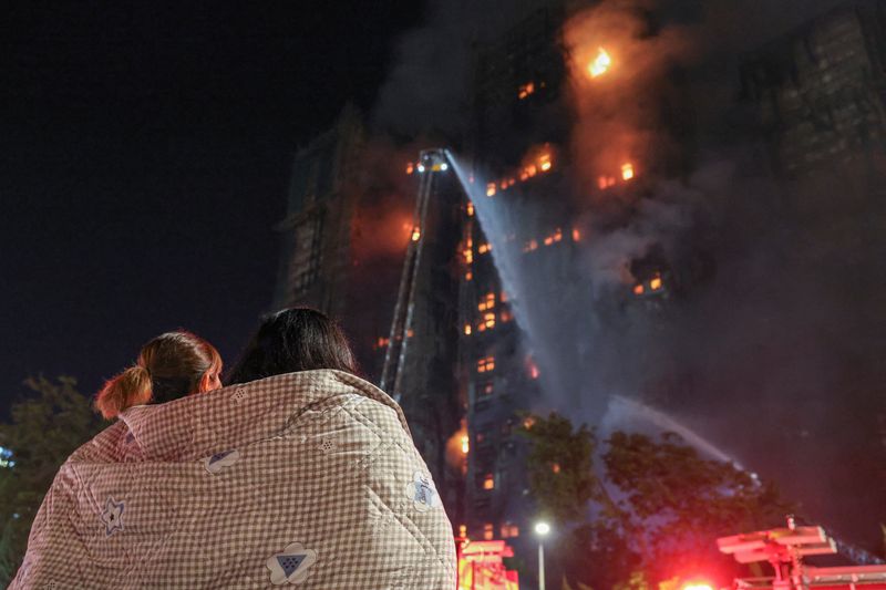 Hong Kong buildings blaze kills at least 36 people, hundreds missing