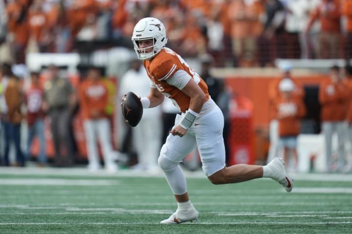 Manning throws 3 touchdowns and No. 20 Texas holds off No. 9 Vanderbilt late for 34