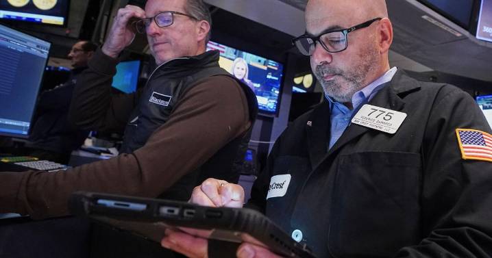 Wall Street swings through another unsettled day ahead of a crucial couple of tests