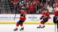 Bench clears in celebration for Marchand’s 1,000th point