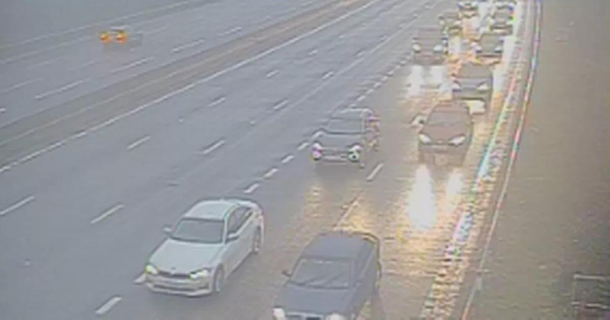 M1 traffic LIVE: Huge crash in torrential rain sparks chaos as air ambulance lands