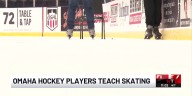 Omaha hockey players teach skating to people with visual impairments
