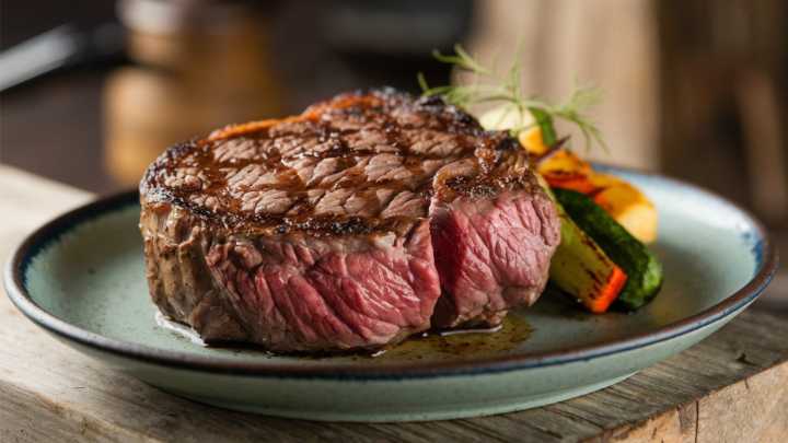 The Lesser-Known Steakhouse Method Often Used For That Crispy, Caramelized Crust