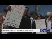 People protest in Tampa against increasing electric utility bill costs