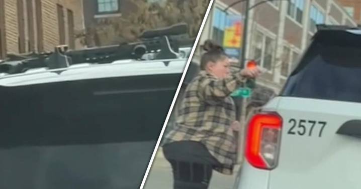 Driver spots assault rifle atop Des Moines police officer's squad car