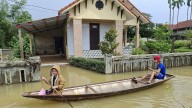 Floods kill 13 in Central Vietnam as rescue operations push forward