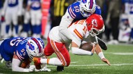 Michael Hoecht tore his Achilles, but stayed on Bills’ sideline until they beat the Chiefs