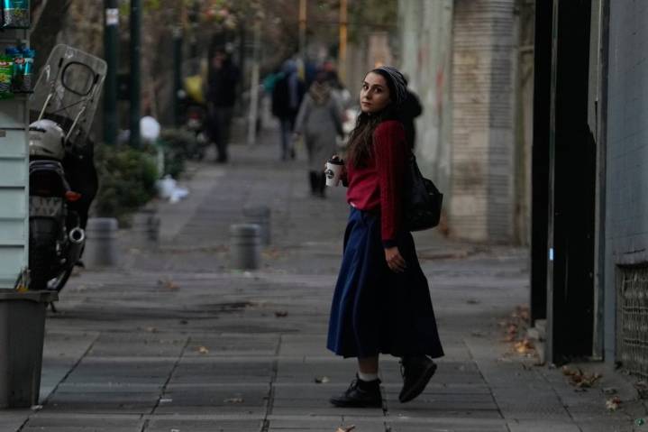 In brief glimpses of Tehran, an AP journalist sees a changing and challenged Iran