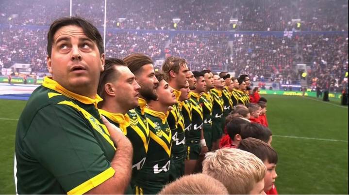 Notorious pitch invader Jarvo stands with Aussies during national anthem as Kangaroos thump England