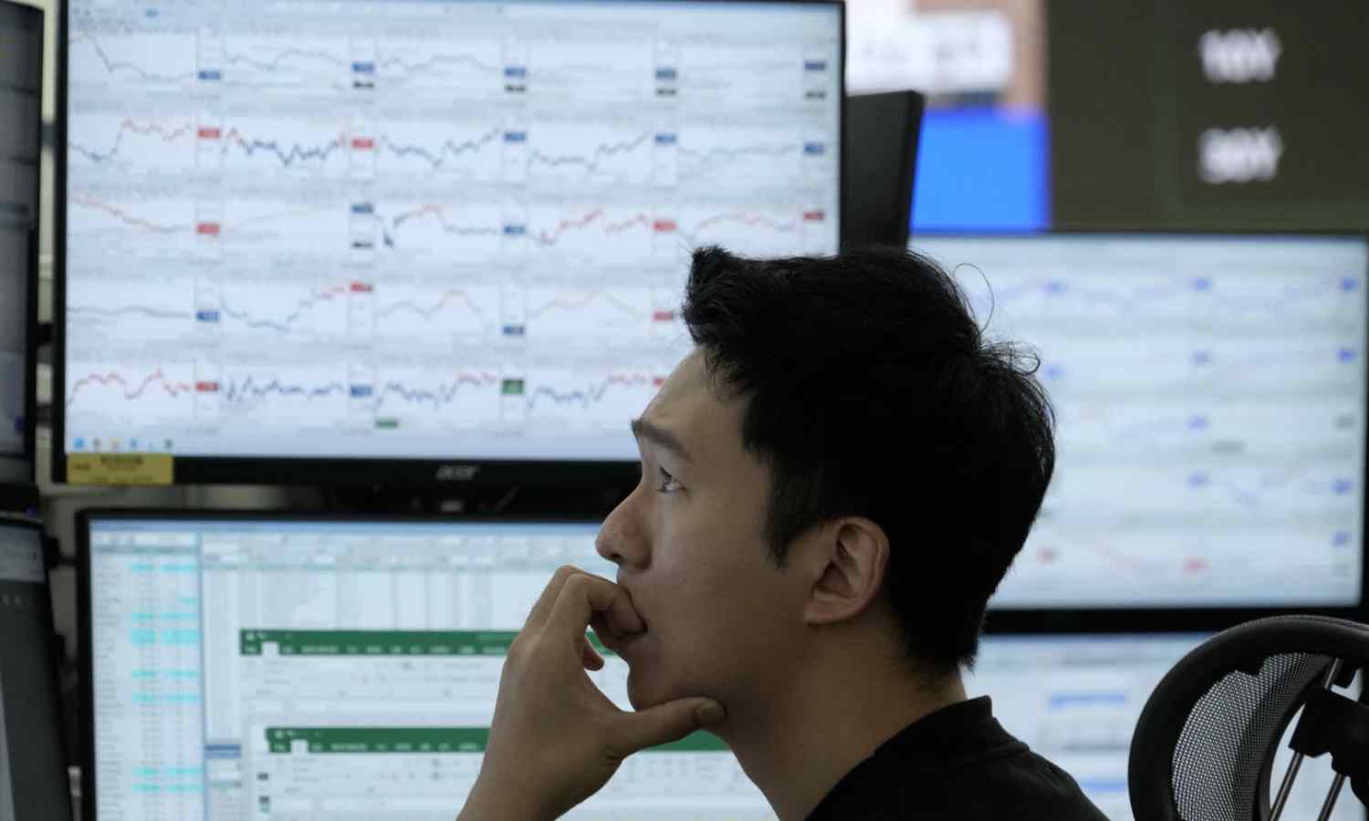 Asian shares fall, tracking Wall Street's tumble on worries about AI stocks and interest rates