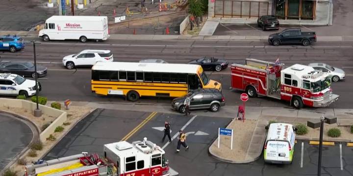 Rescues underway after crash involving school bus in north Phoenix
