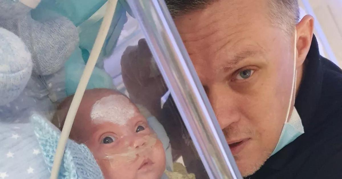 Grieving dad says loss of twin sons like living in 'hell on earth'