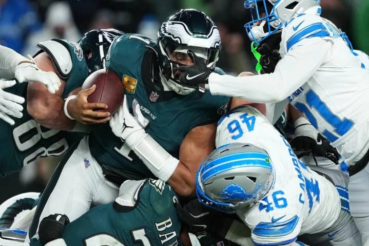 Defense, Hurts’ lone TD lead Eagles over Lions