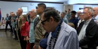 Veterans gather at Foster Village after traditional ceremonies cancelled