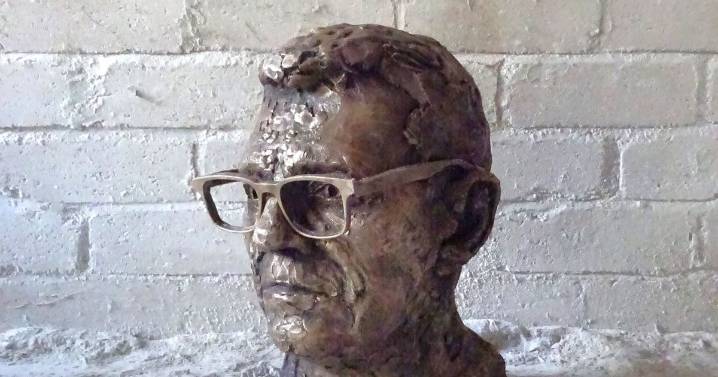 Andy Burnham responds after he's shown 18kg bronze sculpture of his head