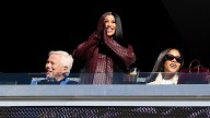 Cardi B supports Patriots WR Stefon Diggs next to Robert Kraft at Gillette