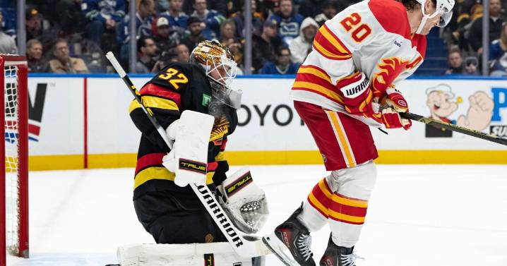 Flames beat Canucks 5-2 to finish back-to-back set with 3rd straight win
